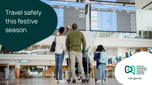 Image of a family looking at a flight departure screen with text reading "Travel safely this festive season"