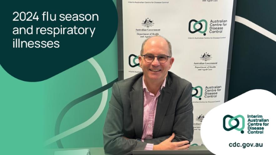 Professor Paul Kelly sitting in front of CDC branding at the webinar