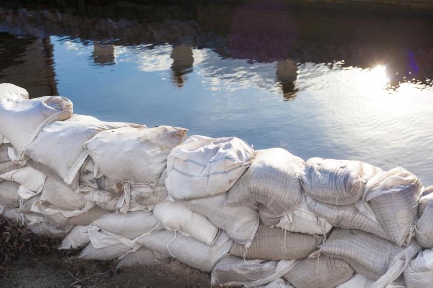 Image of sandbags holding back water