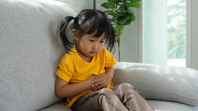 Image of a young girl on a couch