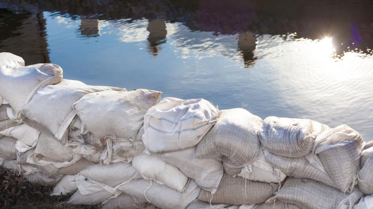 Image of sandbags holding back water